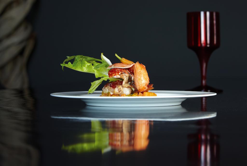 The Vine Hotel Фуншал Экстерьер фото A plate of food